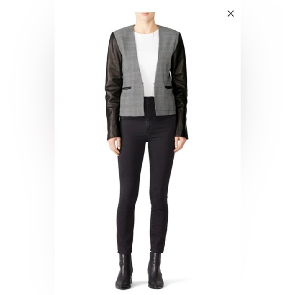 Veda large leather sleeve smoke jacket.